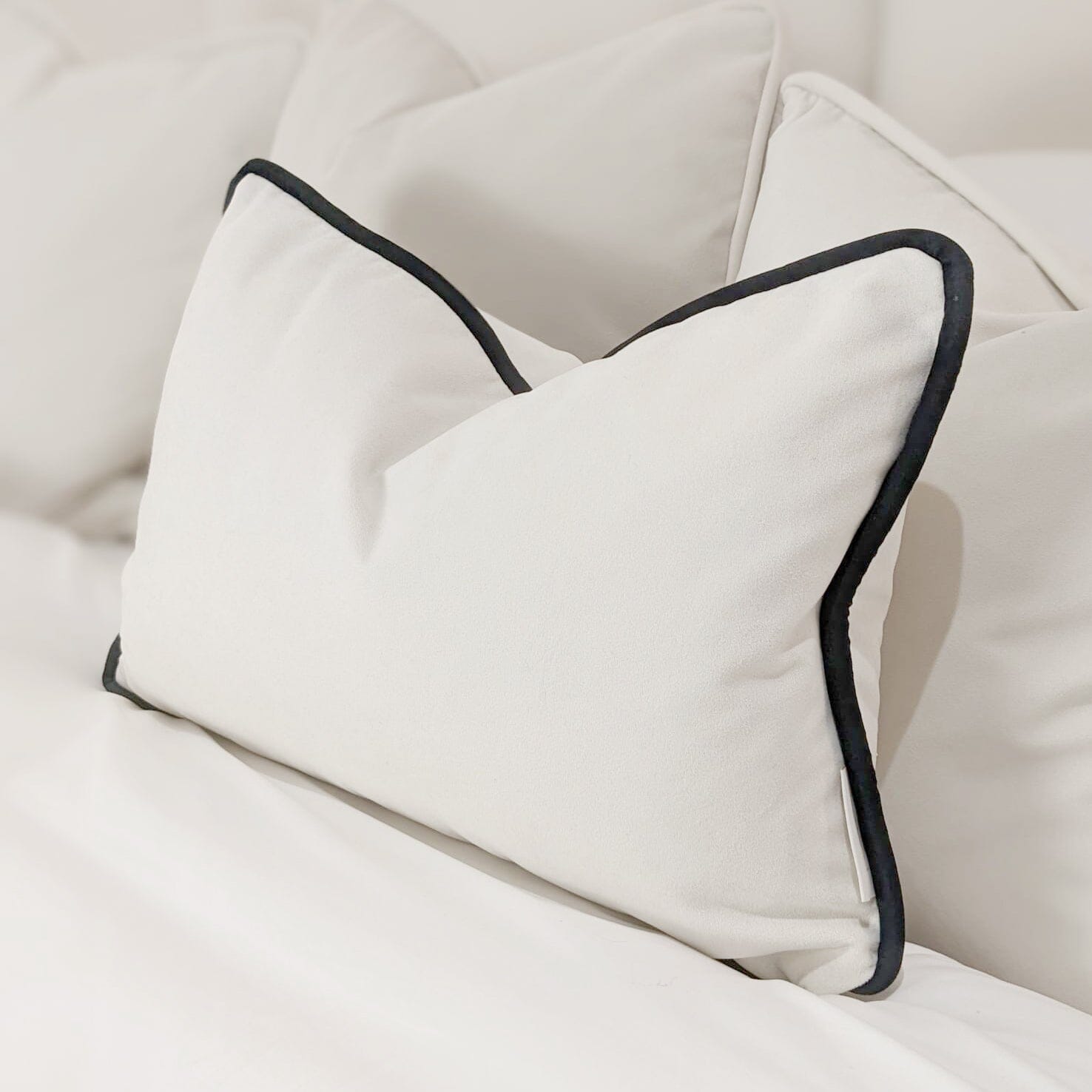 Ari Cream Velvet Bolster Cushion with Black Piping - 35x50cm