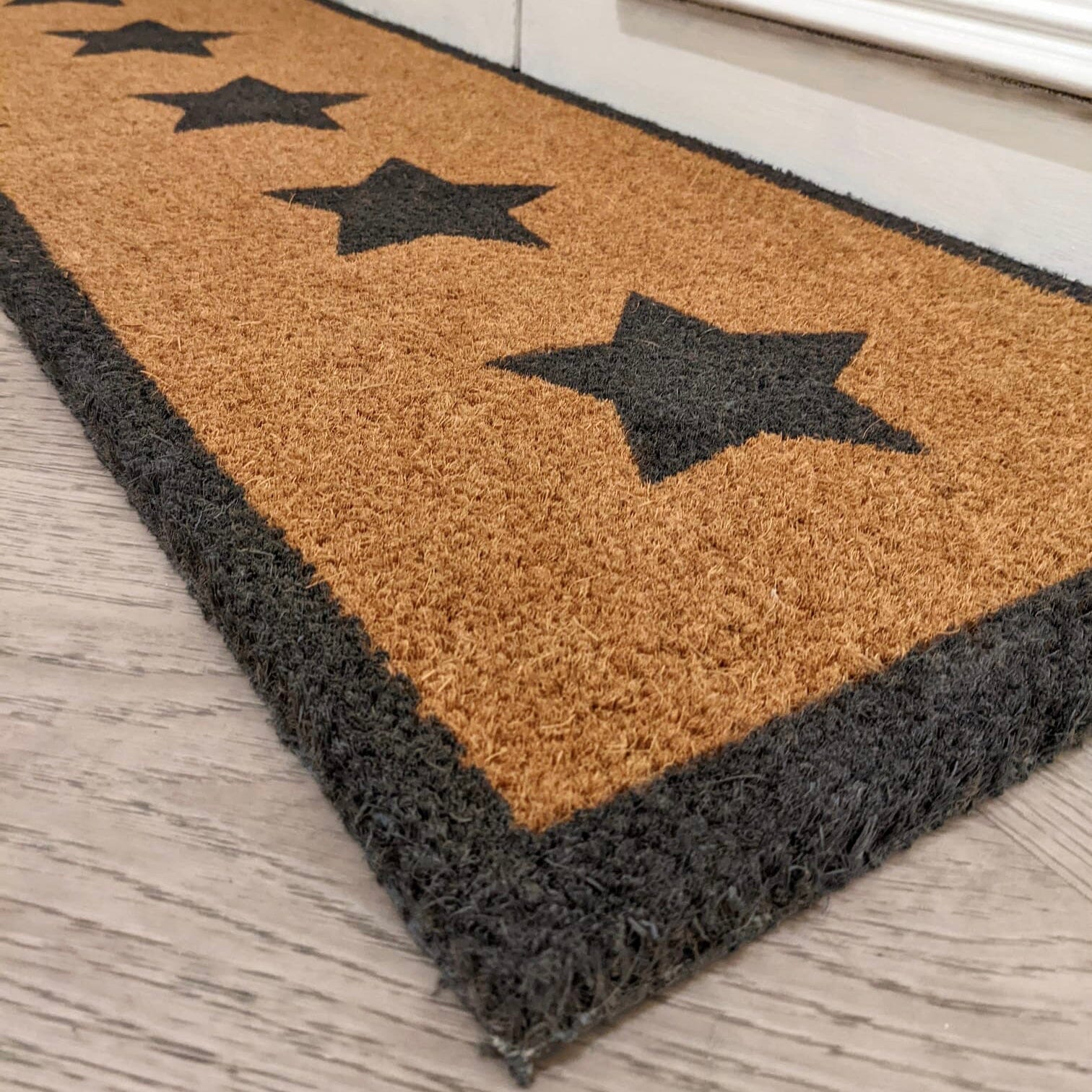 Manami Natural Black Star Print Large Doormat with Black Border